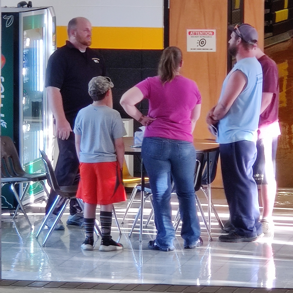 Mr. Simms discusses the coming year with parents and students. 